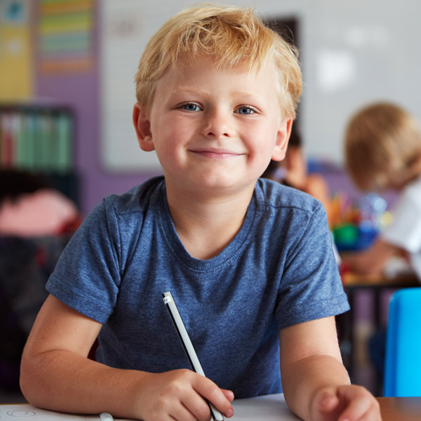 Close-up of boy in classroom