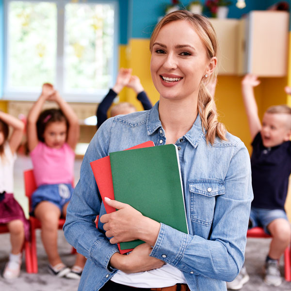 Teacher in classroom with her students