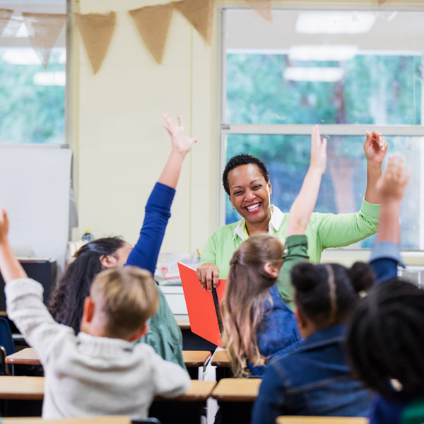 Teacher in classroom with students