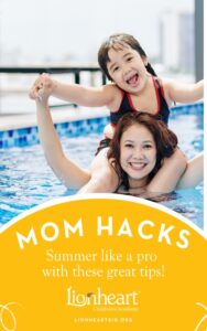 The mother and daughter happily playing in pool