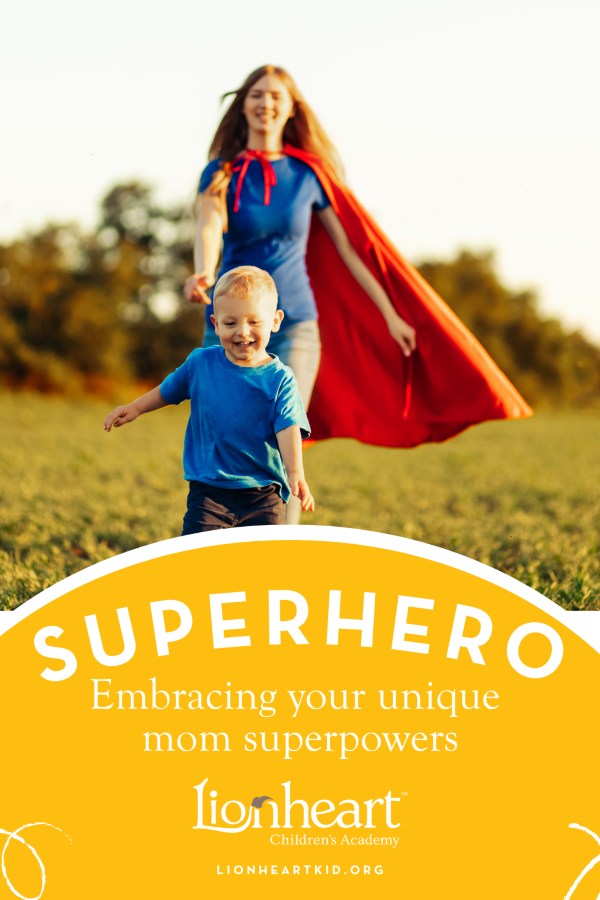 Joyful young boy running through an open field while his mother chases after him in Texas 