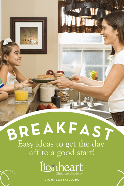 Mother serving breakfast to her young son and daughter