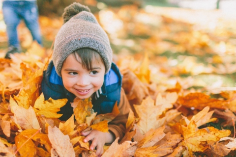 The Kid lying down in leaves, TX.