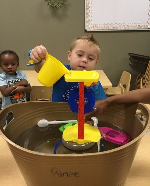 Children engaging in STEM education activities at Lionheart Children's Academy

