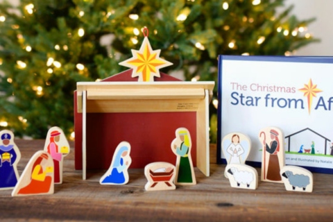 A Star From Afar nativity for preschool, prek, toddler, and school-age kids shown in front of a Christmas tree.