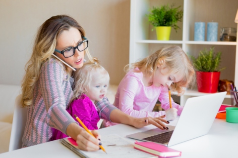The mom of young children balances the mental load of work and mothering.