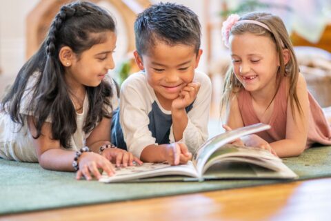 Picture of preschool and Pre-K children reading together