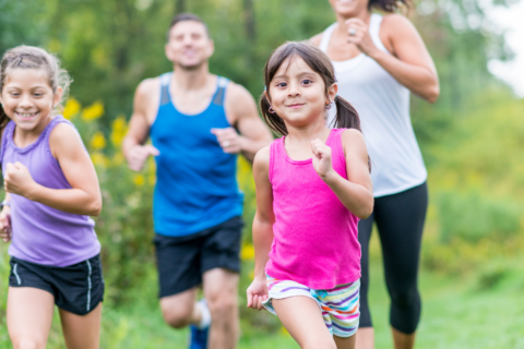 Family staying fit and having fun running together